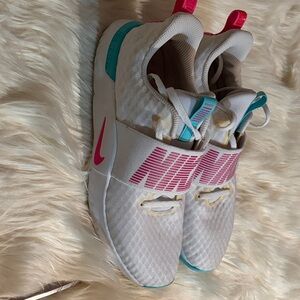 Nike White and Pink Athletic Shoes with Teal Highlights